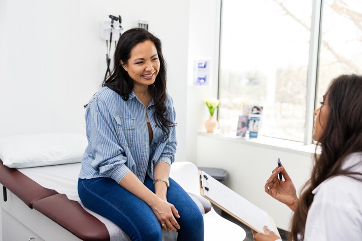 Female patient happy to hear good news about tests results